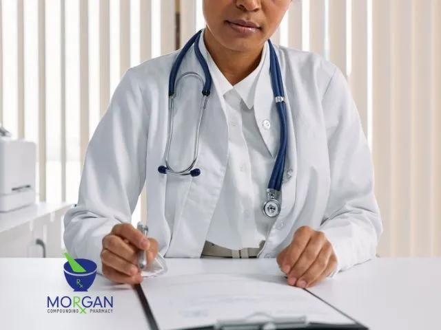 Healthcare Provider Reviewing Paperwork with Stethoscope
